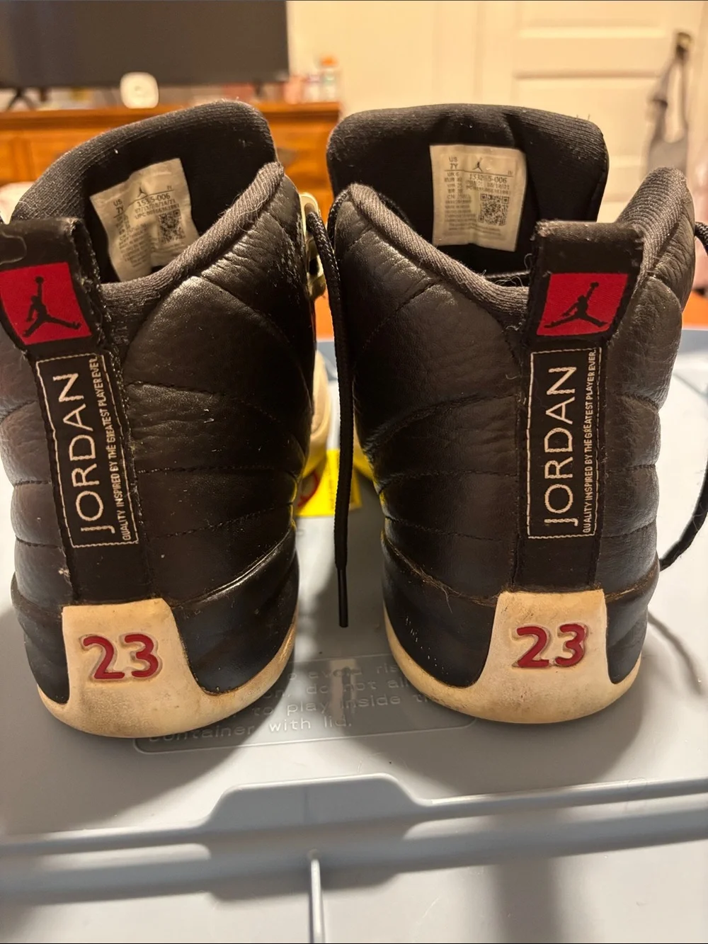Jordan 12s  Kids Black and White High-Top Sneakers with Red Jumpman